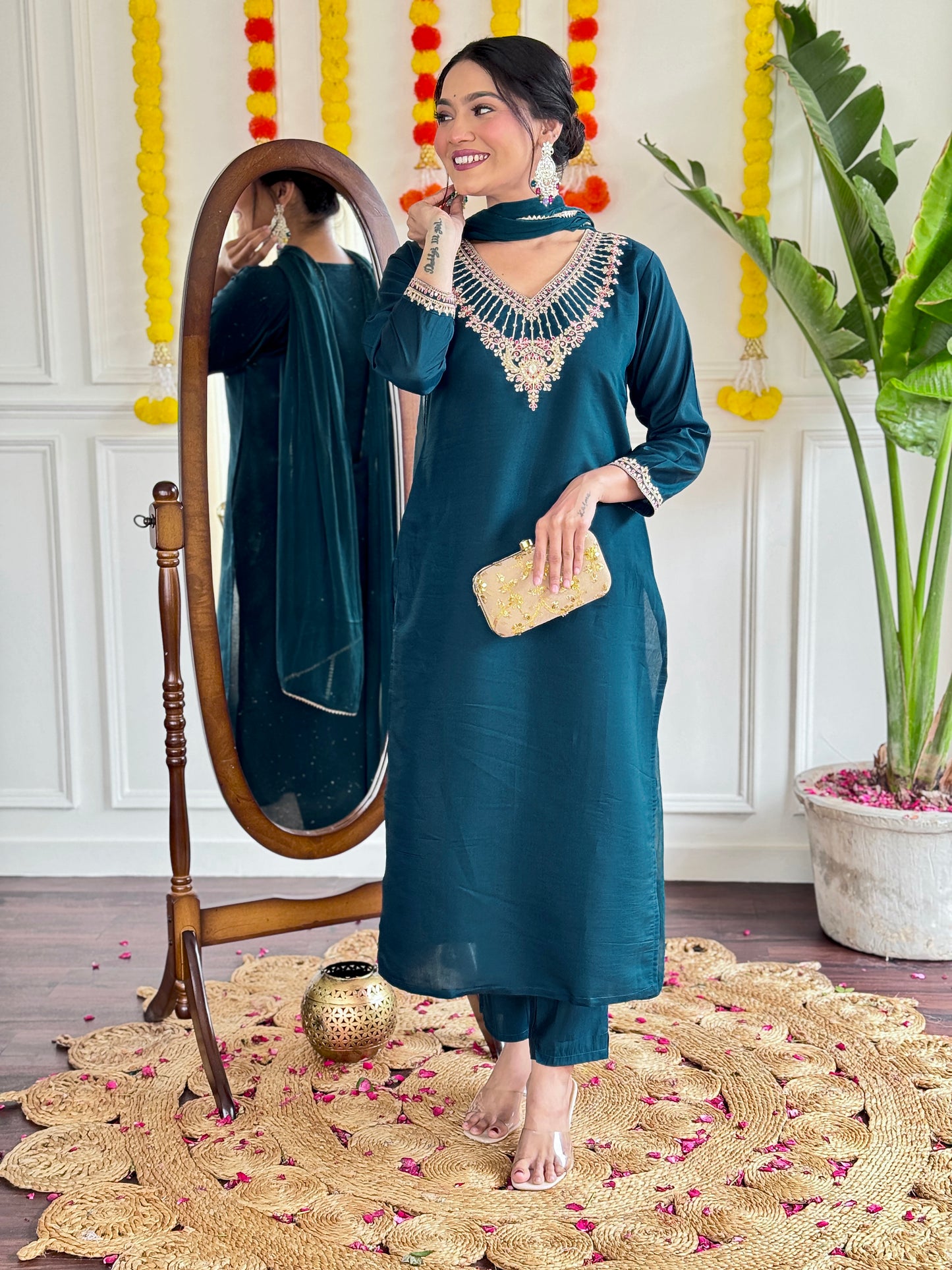 Women Embroidered Kurta with Pants And Dupatta Set